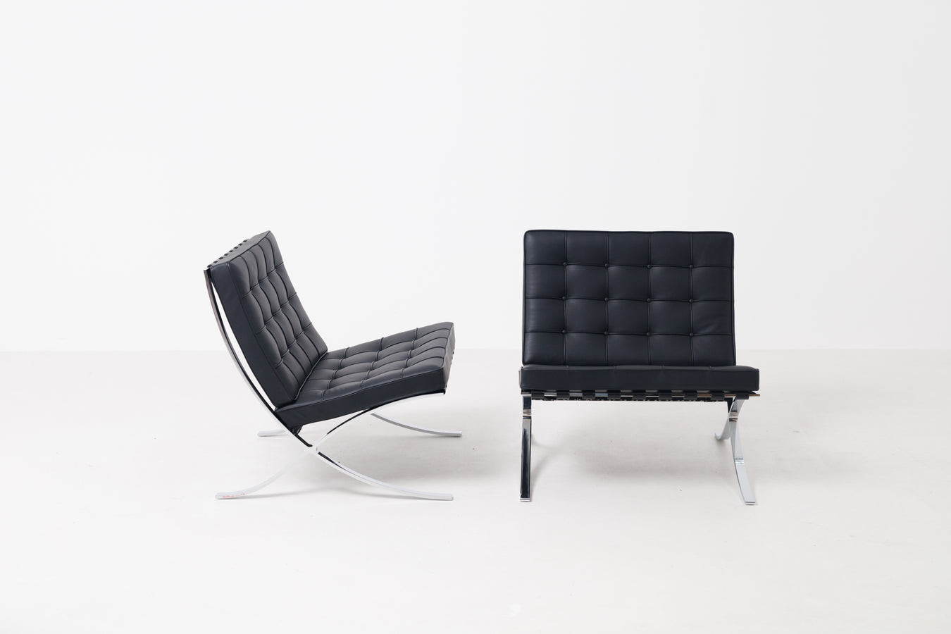 Set of 2 Black Leather Barcelona Chairs by Mies van der Rohe for Knoll
